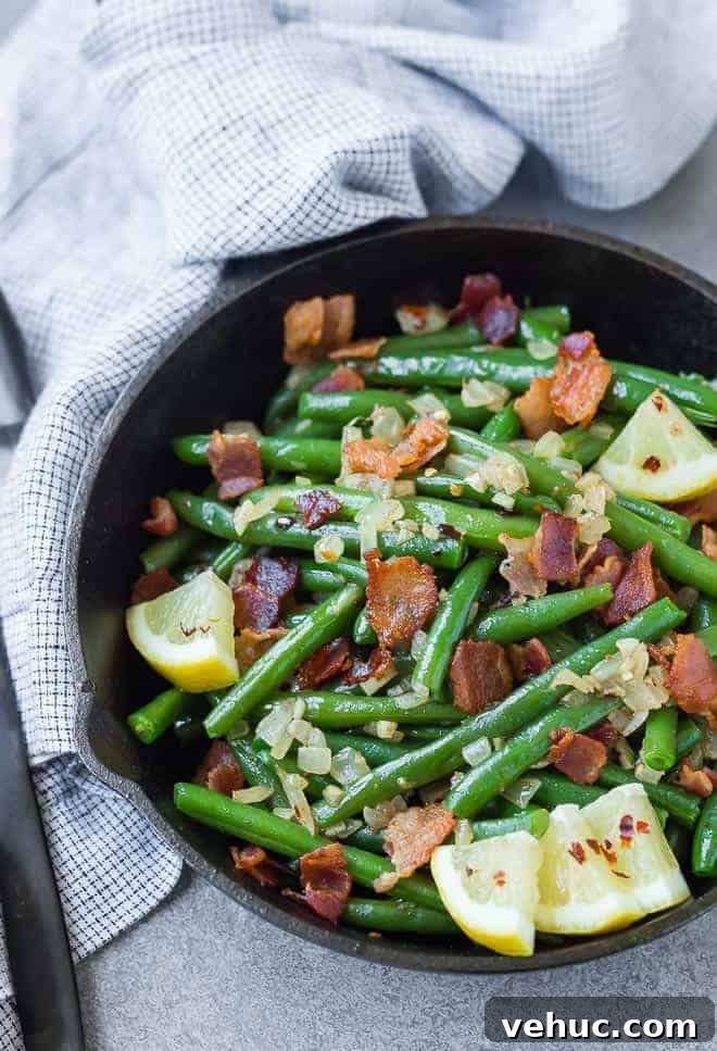 Crispy Bacon Green Beans with Garlic and Caramelized Onions 4 A match made in heaven, these green beans with bacon are completely irresistible.