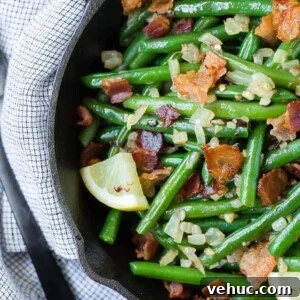Crispy Bacon Green Beans with Garlic and Caramelized Onions 7 A match made in heaven, these green beans with bacon are completely irresistible.