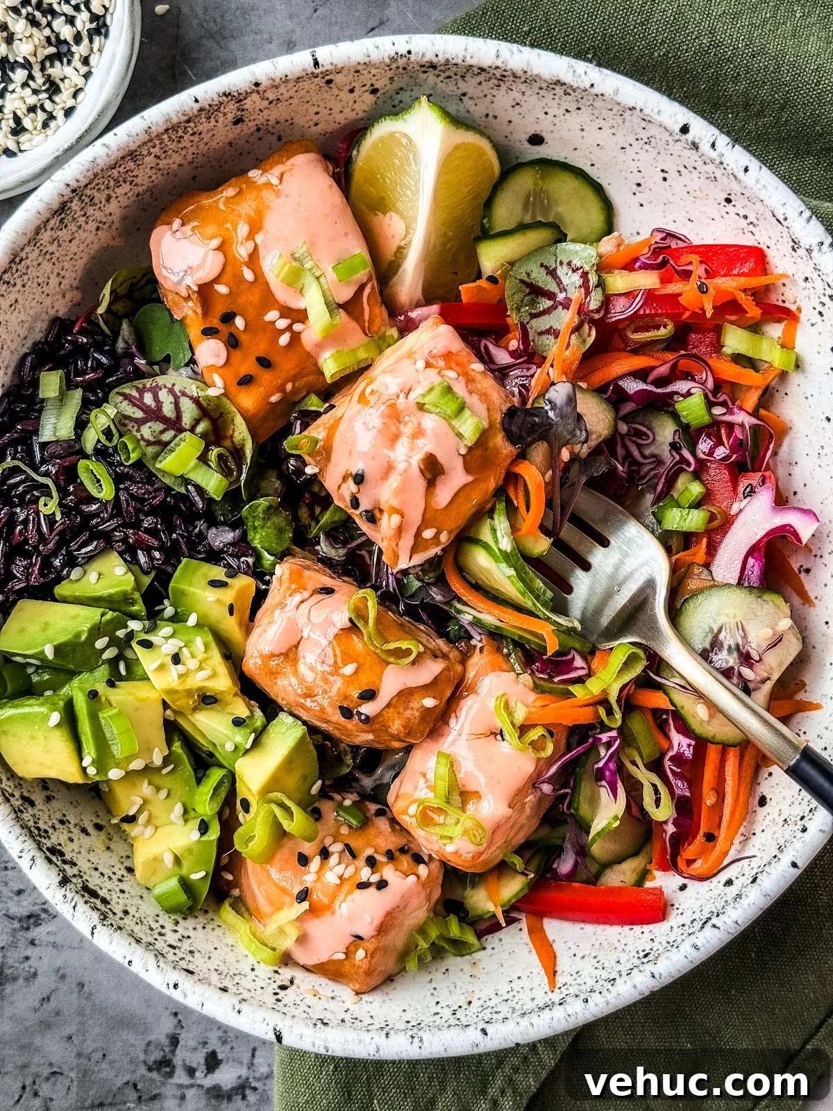 Teriyaki Salmon Bowl Recipe with Rice and Veggies 2 Bowl of teriyaki salmon with veggies and rice.
