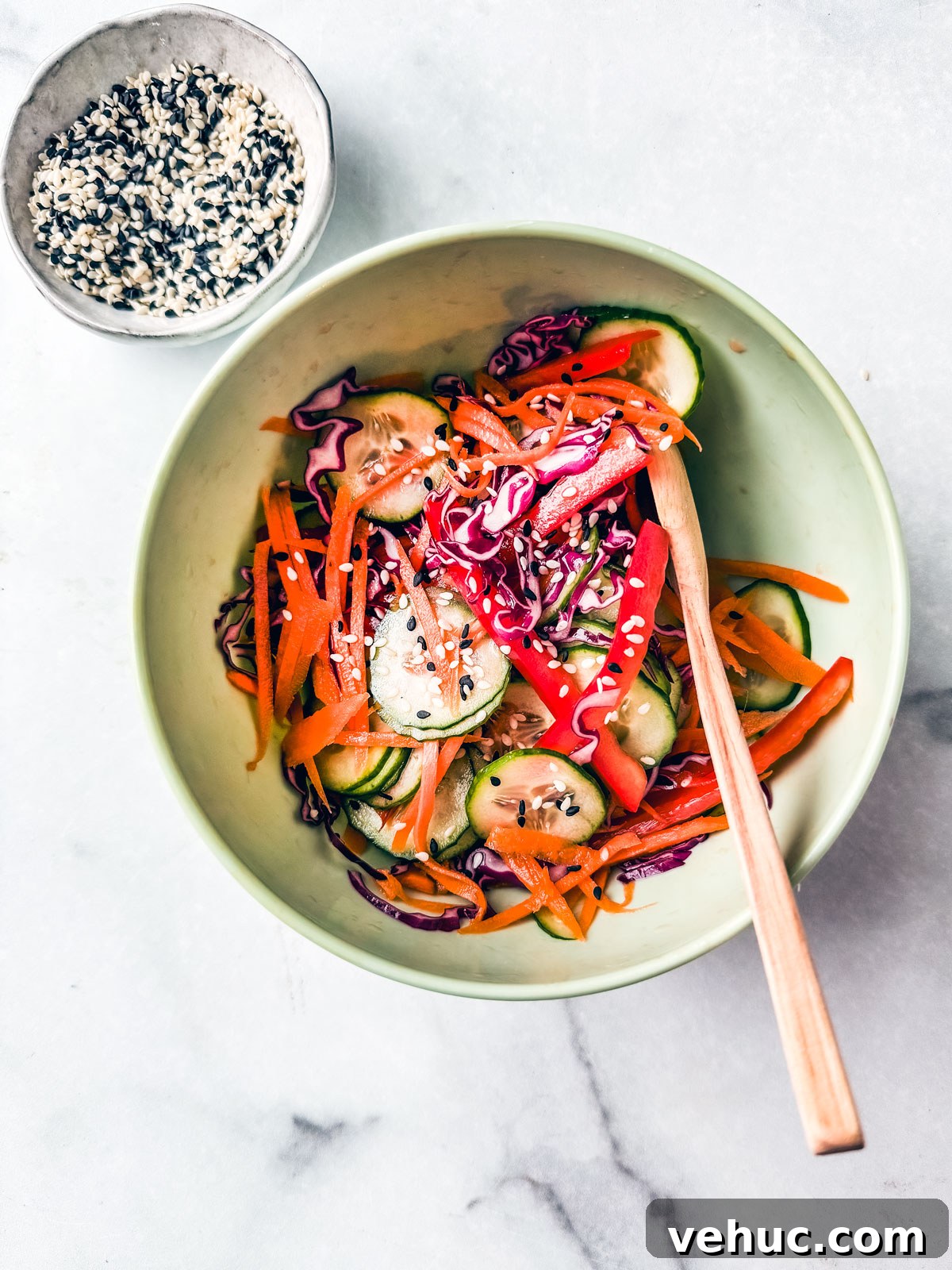 Teriyaki Salmon Bowl Recipe with Rice and Veggies 6 Chopped vegetables in a small mixing bowl.