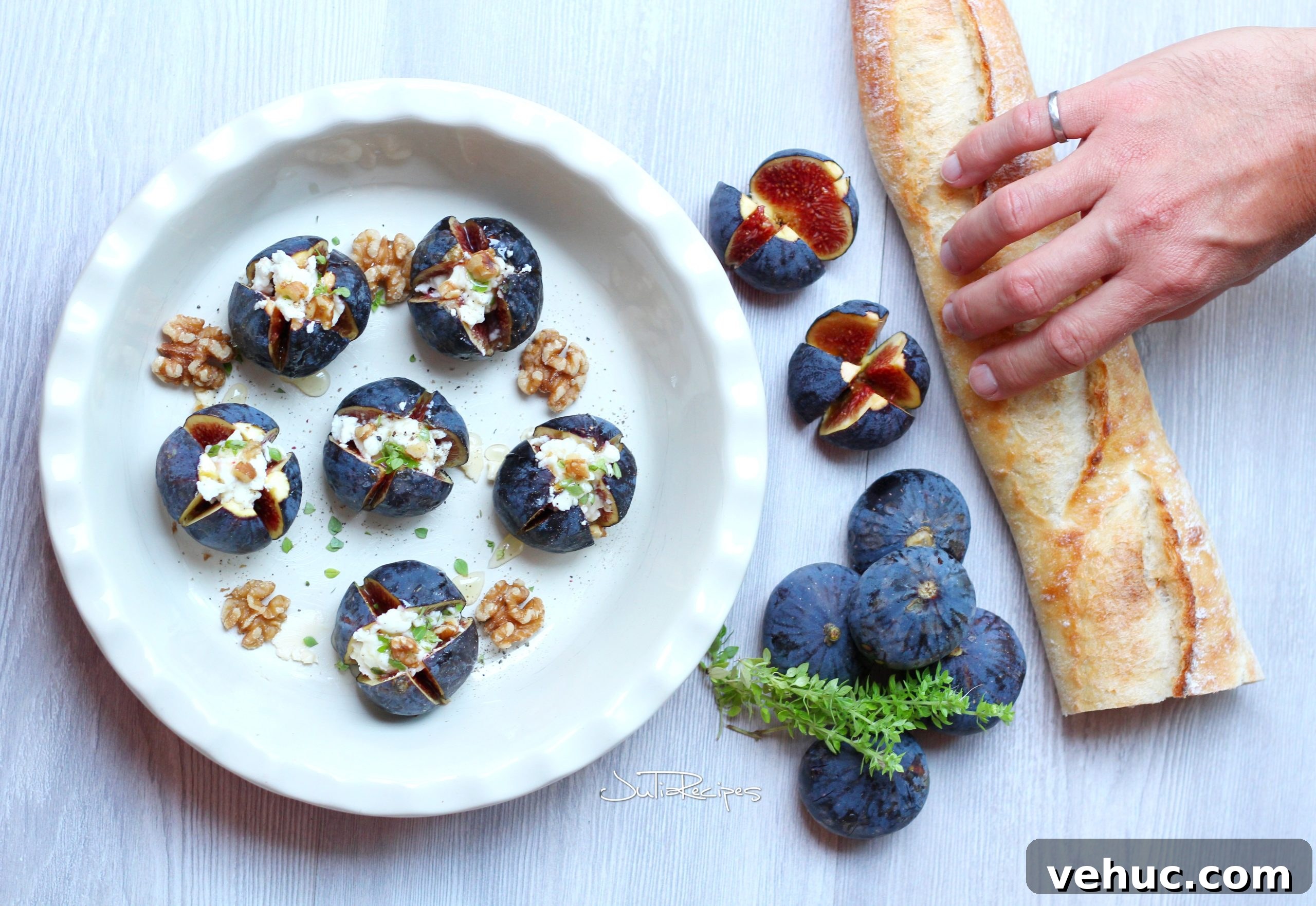 Baked Figs with Goat Cheese and Honey for a Simple Appetizer 3 figs filled with goat cheese read y to be baked