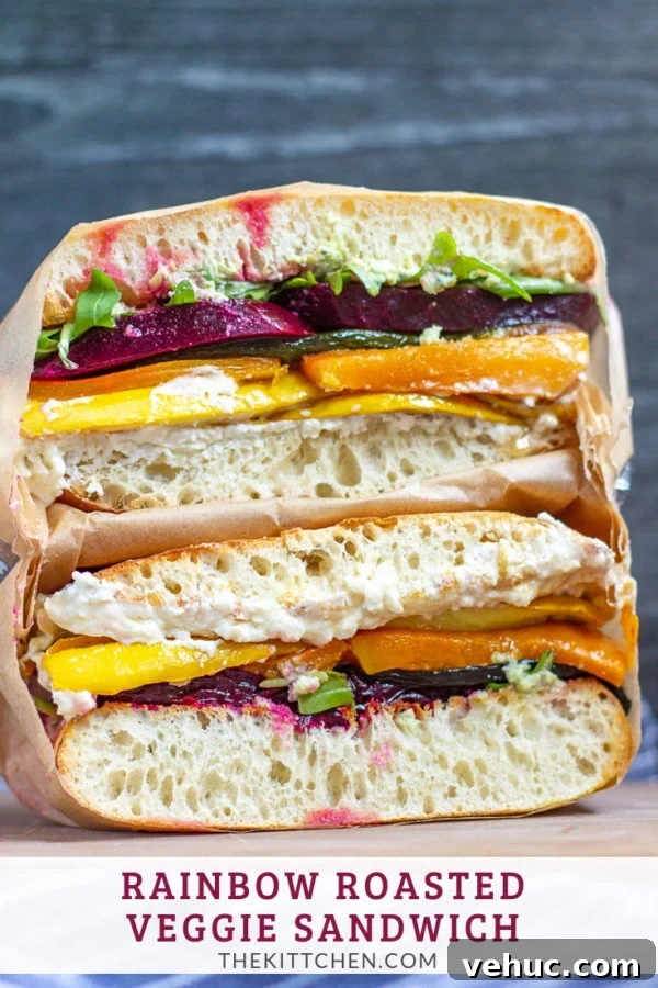 Rainbow Roasted Vegetable Sandwich | A colorful sandwich made with layers of roasted beets and squash with whipped feta and hummus.