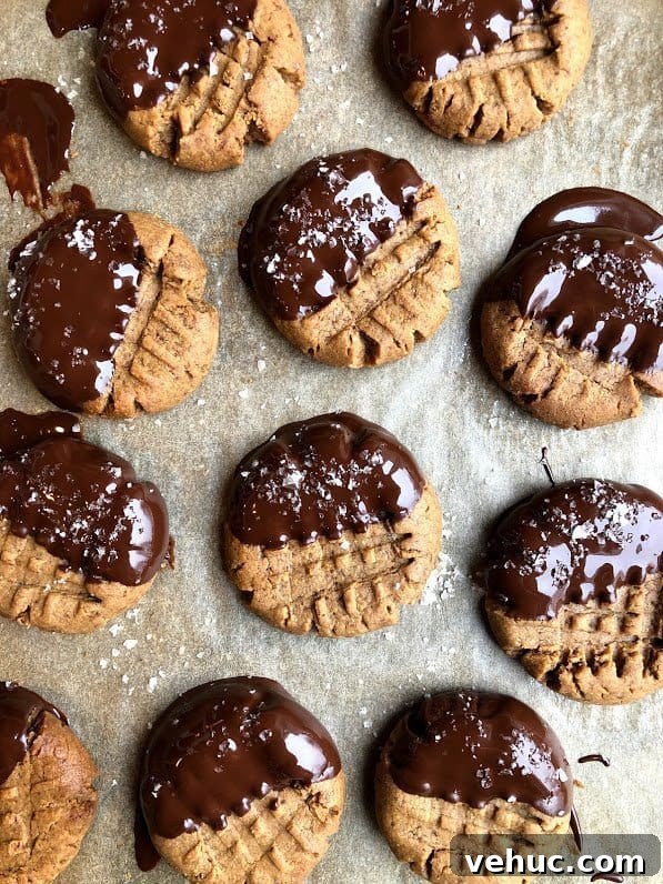 3-Ingredient Peanut Butter Cookies Recipe You’ll Love 3 three ingredient peanut butter cookies on baking sheet