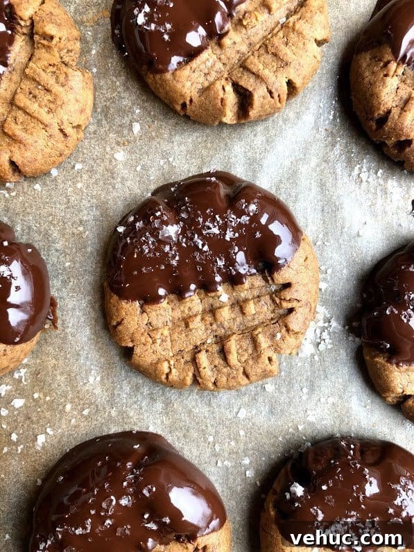 3-Ingredient Peanut Butter Cookies Recipe You’ll Love 4 peanut butter cookie on a tray