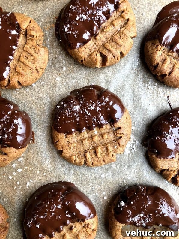 3-Ingredient Peanut Butter Cookies Recipe You’ll Love 5 three ingredient peanut butter cookies on a tray