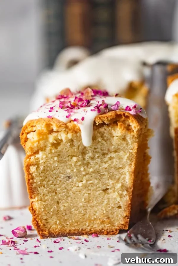 Decadent Oreo Pound Cake Recipe: Moist Cookies and Cream Loaf 12 a slice of cream cheese pound cake with rose petals