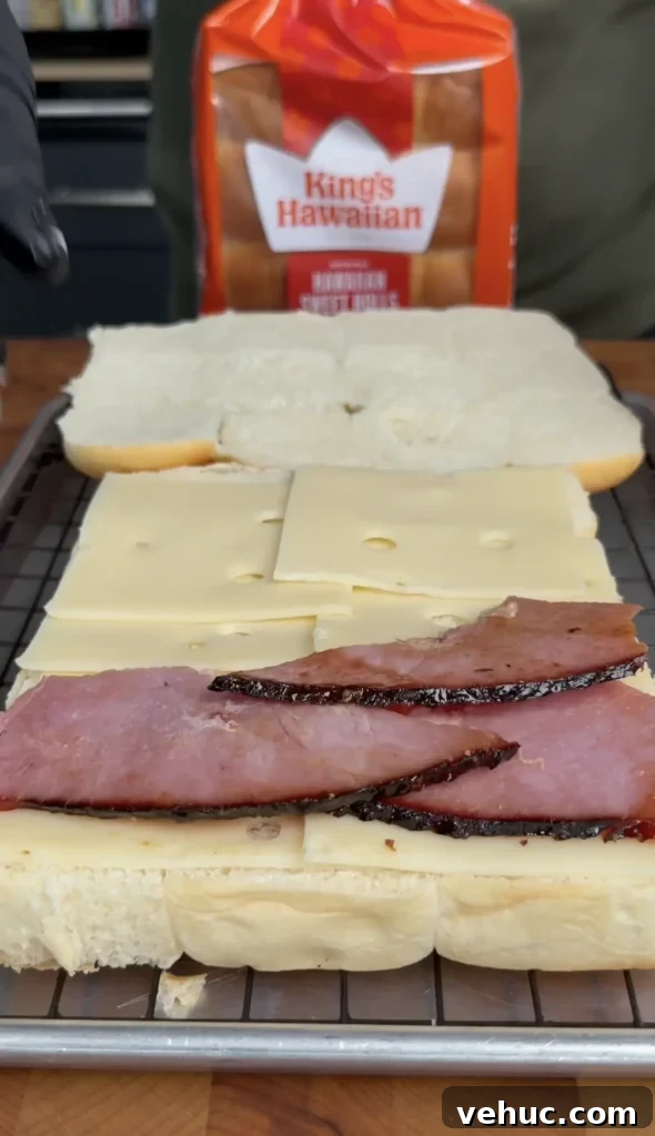 Smoked Ham Sliders with Cranberry Bacon Jam Recipe 10 assembled sliders on a wire rack