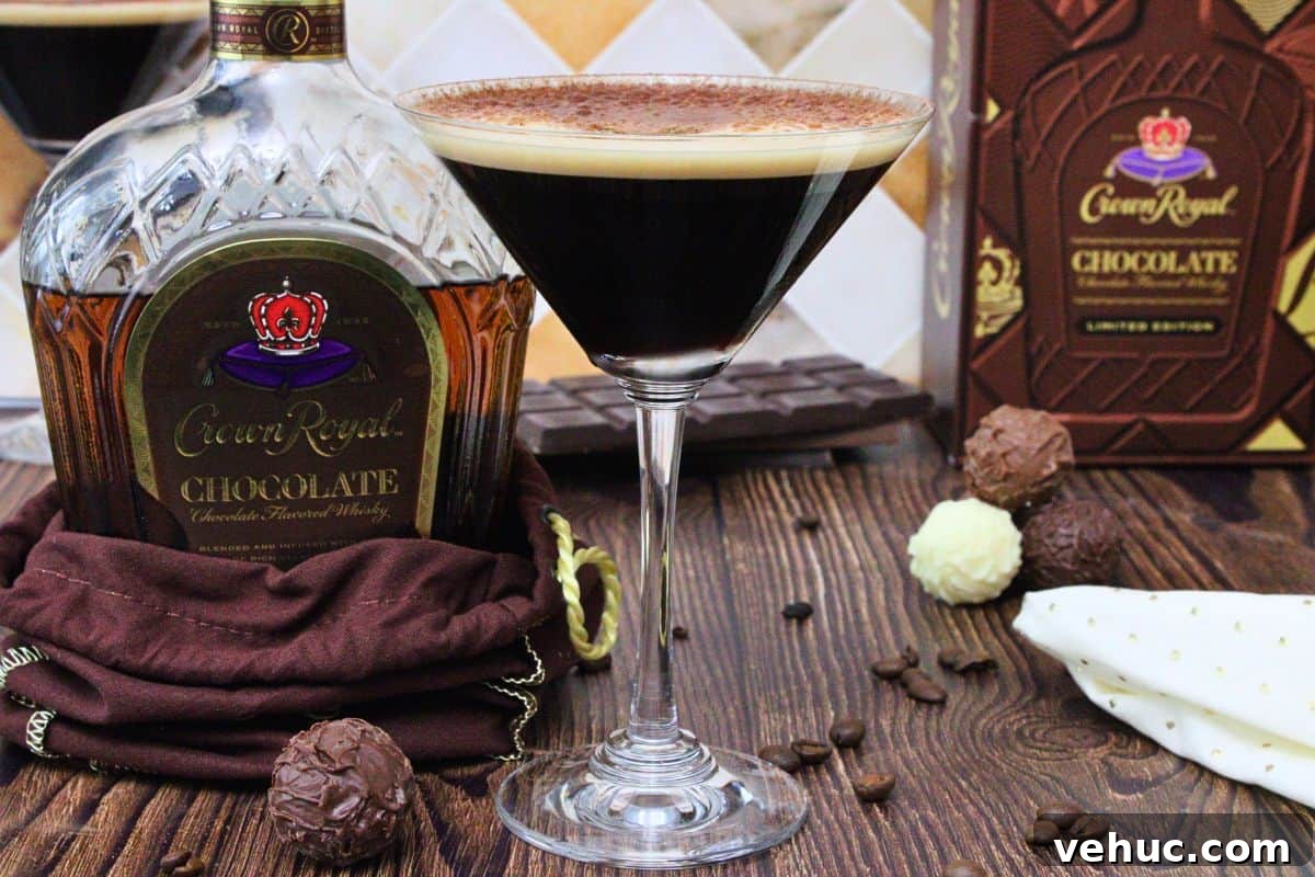 12 Irresistible Chocolate Crown Royal Cocktails to Try Tonight 5 chocolate espresso martini with cocoa dusting next to chocolate crown royal bottle