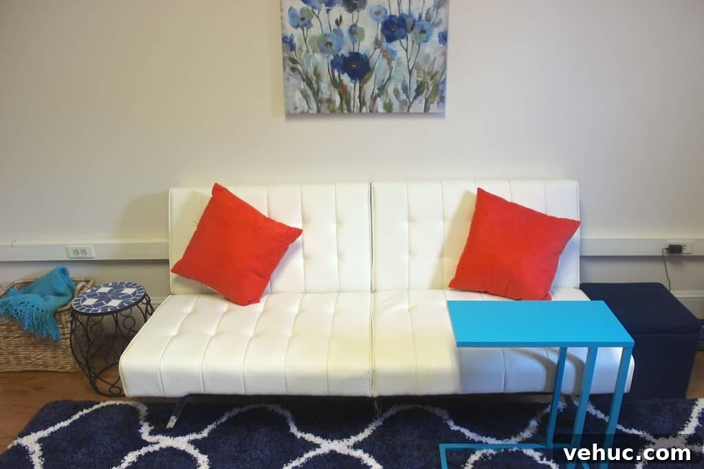 Dorm room inspiration: navy, coral, & turquoise! See the whole dorm room tour by clicking the pin.