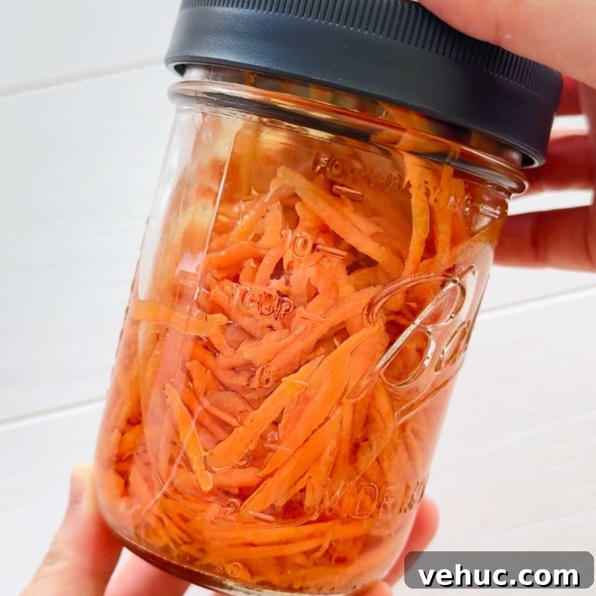 Maple-Pickled Carrots in a Mason Jar: Quick Homemade Recipe 3 maple pickled carrots close up