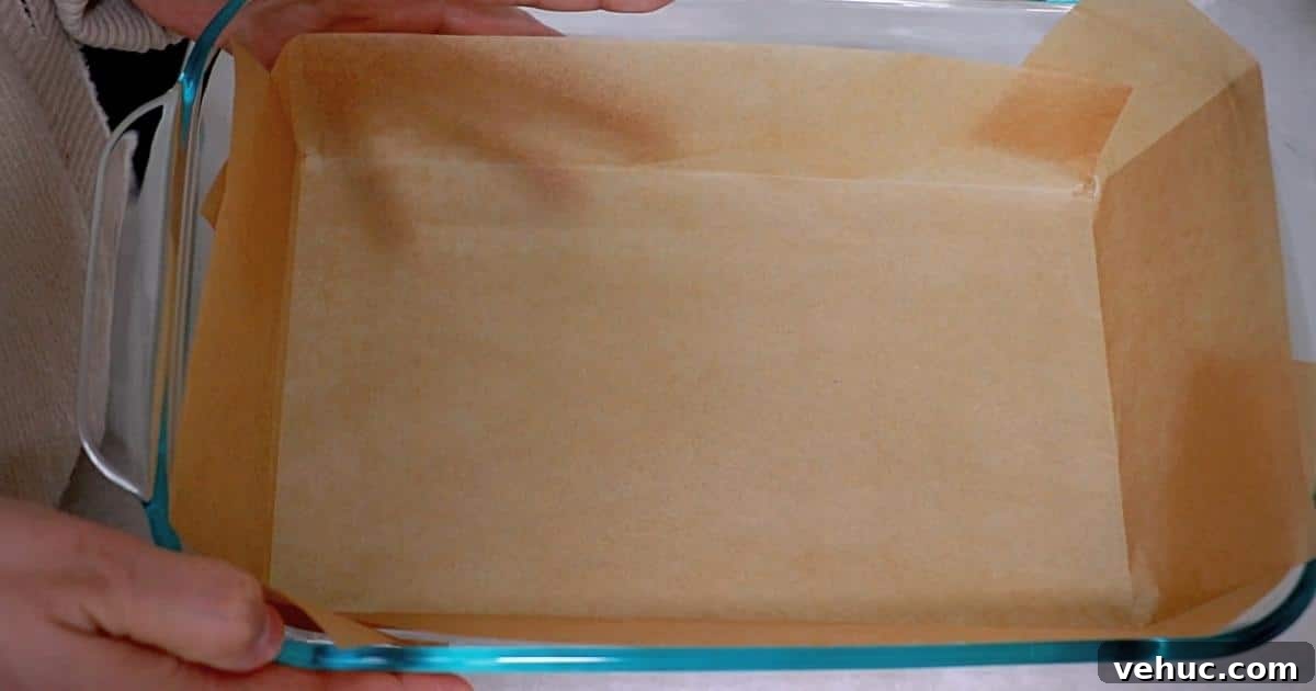 Authentic Tres Leches Cake Recipe: Moist Latin-Style Dessert 7 parchment cake liner in a rectangle pan