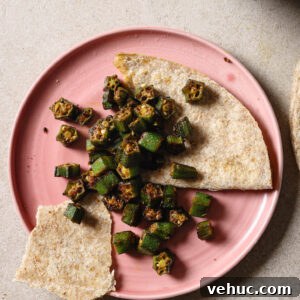 15-Minute Indian-Style Bhindi Fry Recipe for Crispy Okra 16 Partially eaten plate of Bhindi Fry with roti.