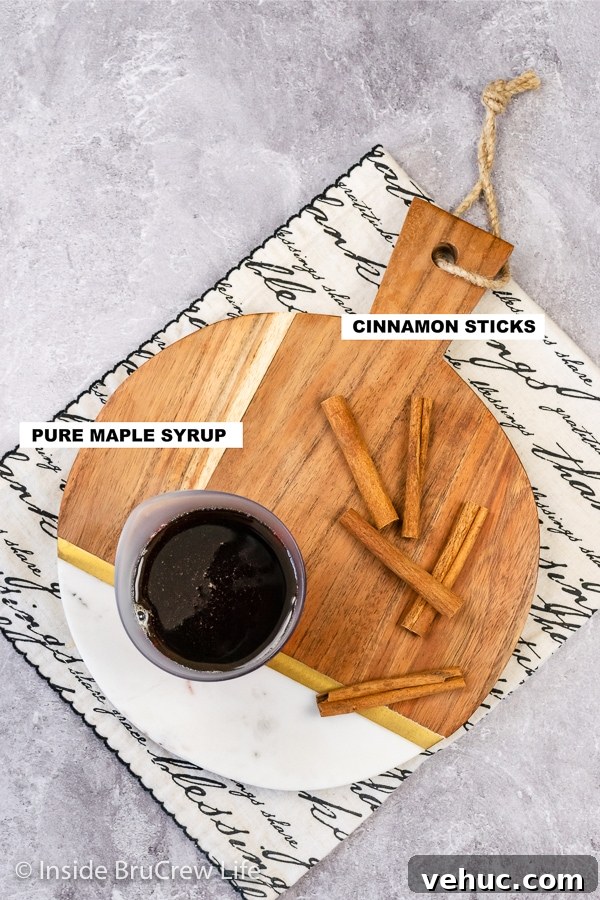 Cinnamon Maple Syrup ingredients Overhead picture of the ingredients needed to make a Cinnamon Maple Syrup.