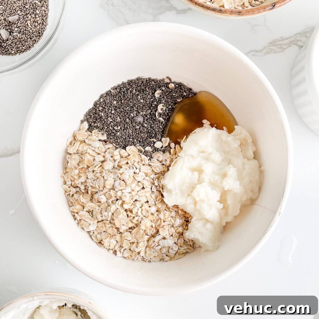 Creamy Cottage Cheese Overnight Oats Recipe for Breakfast 4 Ingredients for cottage cheese overnight oats in a bowl, before adding milk and mixing