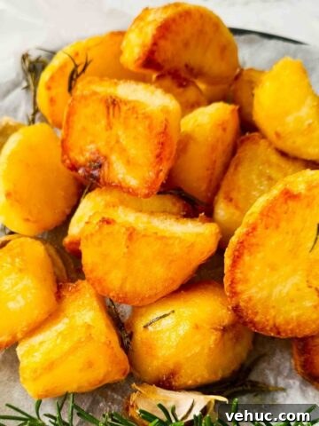 Close up of golden crunchy roasted potatoes