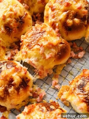 freshly baked cheesy cheese and bacon rolls