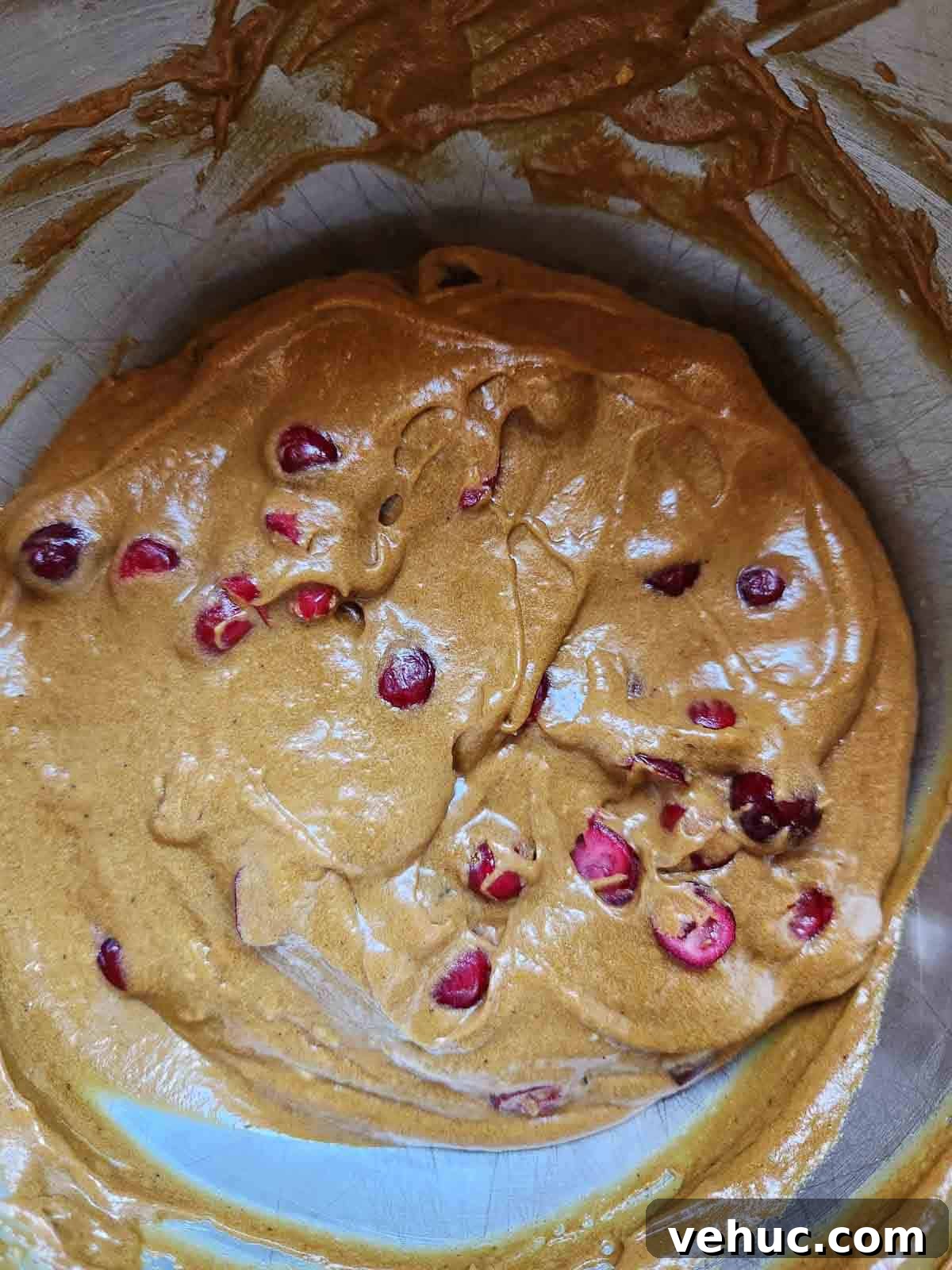 Cranberry Gingerbread Loaf Recipe with Zesty Ginger Glaze 8 Final batter for cranberry loaf in a metal bowl.