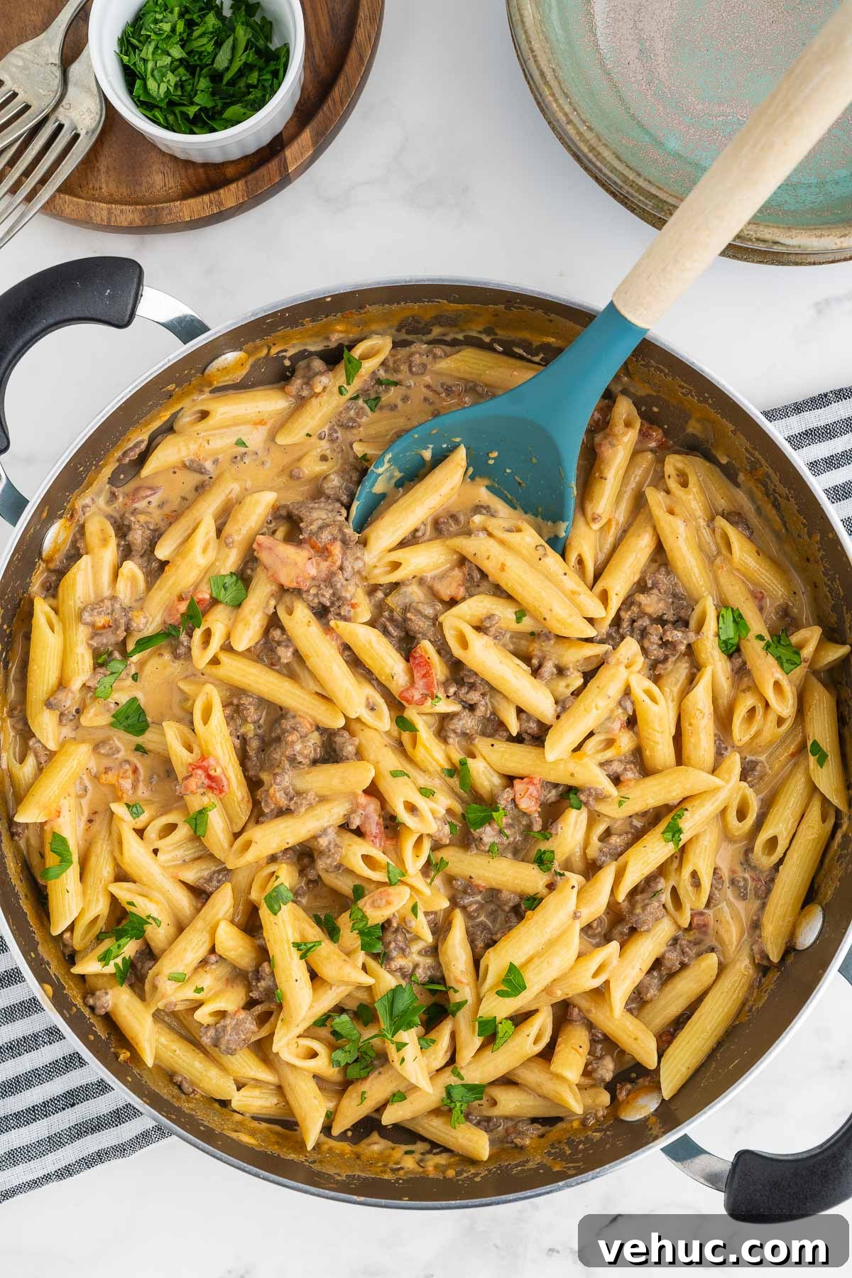 Creamy Rotel Pasta Recipe with Tomatoes and Sausage 2 Rotel pasta in a skillet with creamy cheese sauce