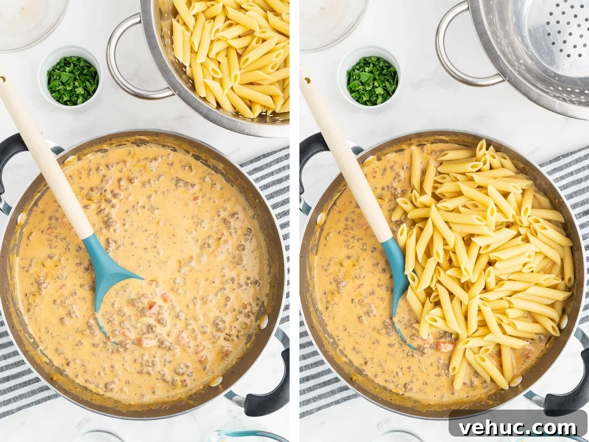 Creamy Rotel Pasta Recipe with Tomatoes and Sausage 5 Stirring pasta into a creamy cheese sauce in a deep skillet