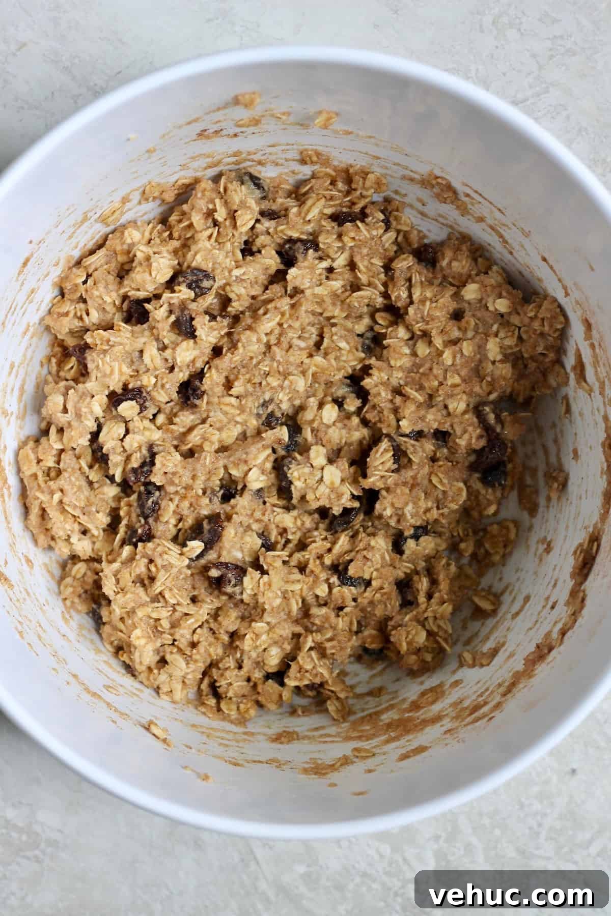 Banana Oatmeal Raisin Cookies (No Added Sugar) 3 white bowl of cookie dough