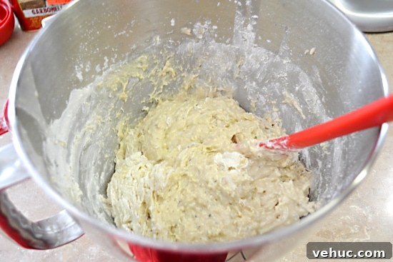 adding remaining flour
