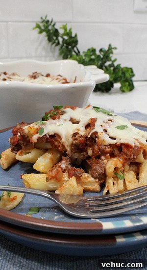 30 Minute Lazy Lasagna is a quick and easy meal your family will love. Cheesy penne pasta with a ground beef meat sauce topped with cheese.