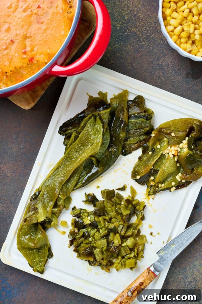 Roasted Poblano and Corn Chowder with Smoky Creaminess 10 Roasted poblano peppers on a cutting board