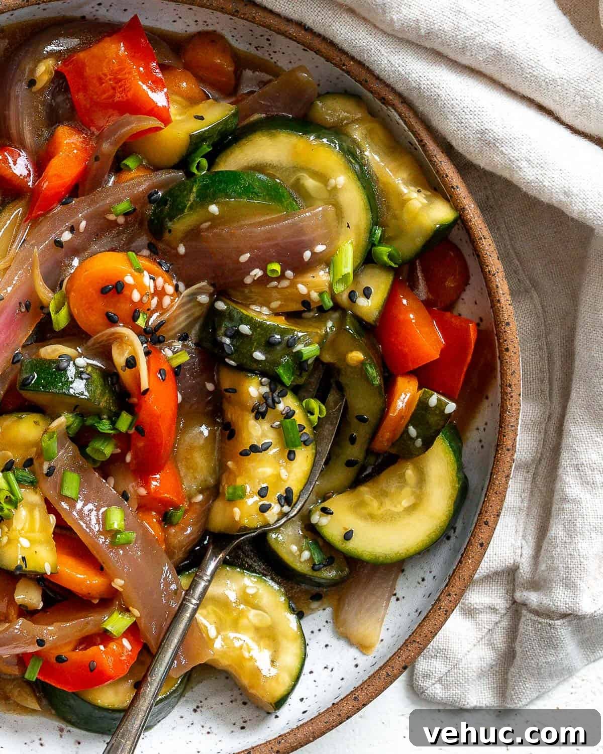 Crispy Garlic Zucchini Stir-Fry Recipe for Weeknight Meals 10 completed Easy Zucchini Stir Fry against a white surface