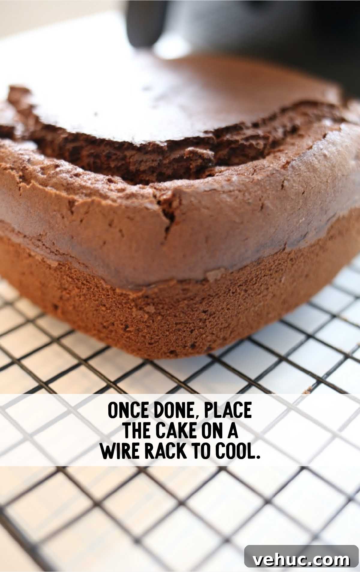Air Fryer Chocolate Cake process shot of cake placed on a cooling rack