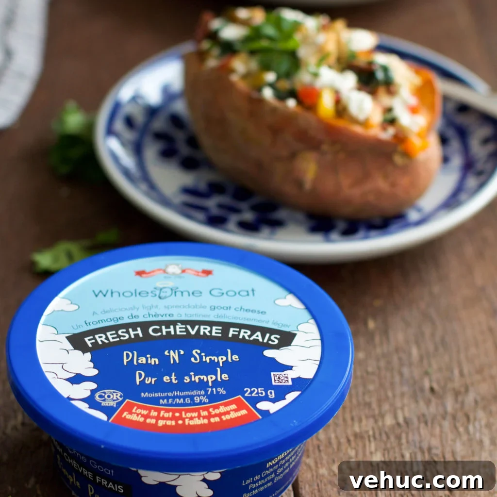 Goat Cheese Chicken Stuffed Sweet Potato_- This ultra-easy to make Goat Cheese Chicken Stuffed Sweet Potato recipe is healthy, filling and delicious. It is made with spinach, chicken, garlic, onions, bell peppers and goat cheese. This is definitely a perfect meal for chilly winter nights that requires simple ingredients. Goat Cheese Chicken Stuffed Sweet Potato Primavera Kitchen Recipe
