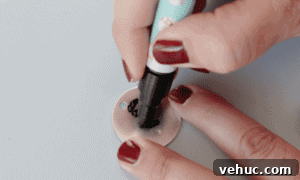 How to Make Stamped Constellation Necklaces (Video) 17 round stamped circle colored with black marker