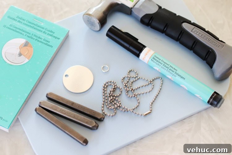 How to Make Stamped Constellation Necklaces (Video) 5 cutting board with stickers, stamps, necklace, round metal circle, marker and hammer