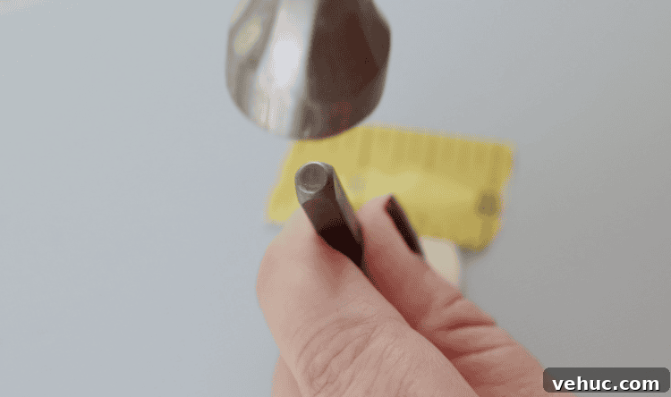 How to Make Stamped Constellation Necklaces (Video) 9 metal stamp and hammer