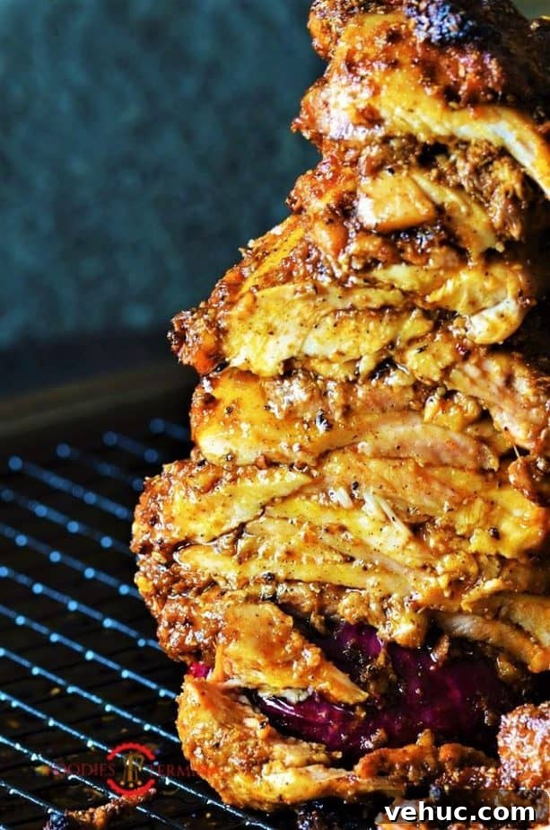 Authentic Greek Chicken Gyros with Creamy Tzatziki Sauce 2 Authentic Greek chicken gyros recipe in a rotisserie