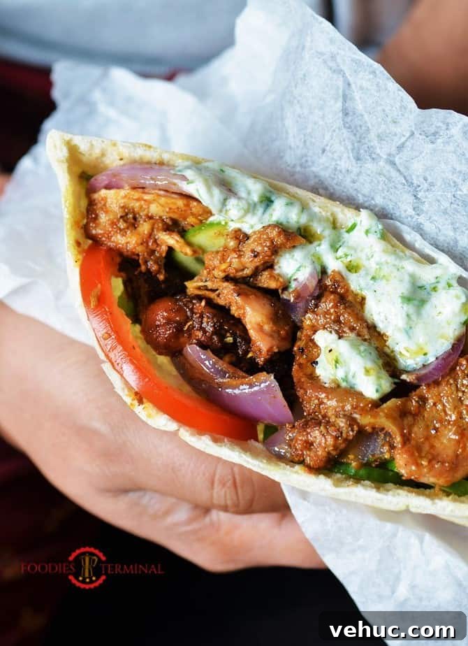 Authentic Greek Chicken Gyros with Creamy Tzatziki Sauce 15 Authentic Greek chicken gyros recipe served inside pita