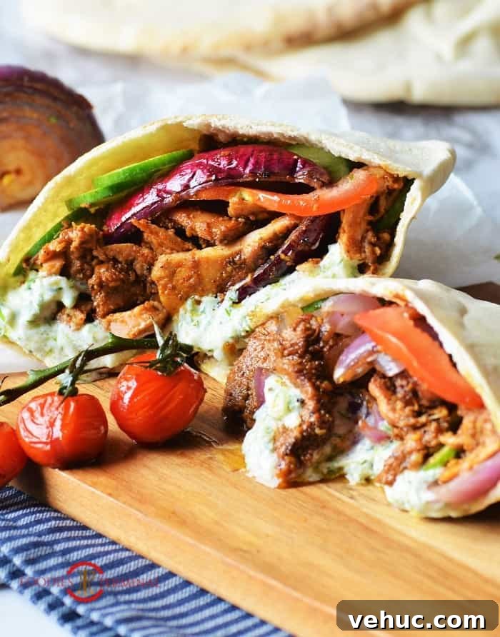 Authentic Greek Chicken Gyros with Creamy Tzatziki Sauce 3 Authentic Greek chicken gyros recipe in pita pockets