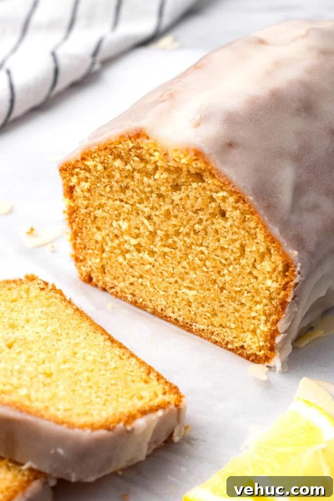Moist Gluten-Free Pound Cake with Rich Buttery Flavor 12 A loaf of gluten free pound cake with sliced slices