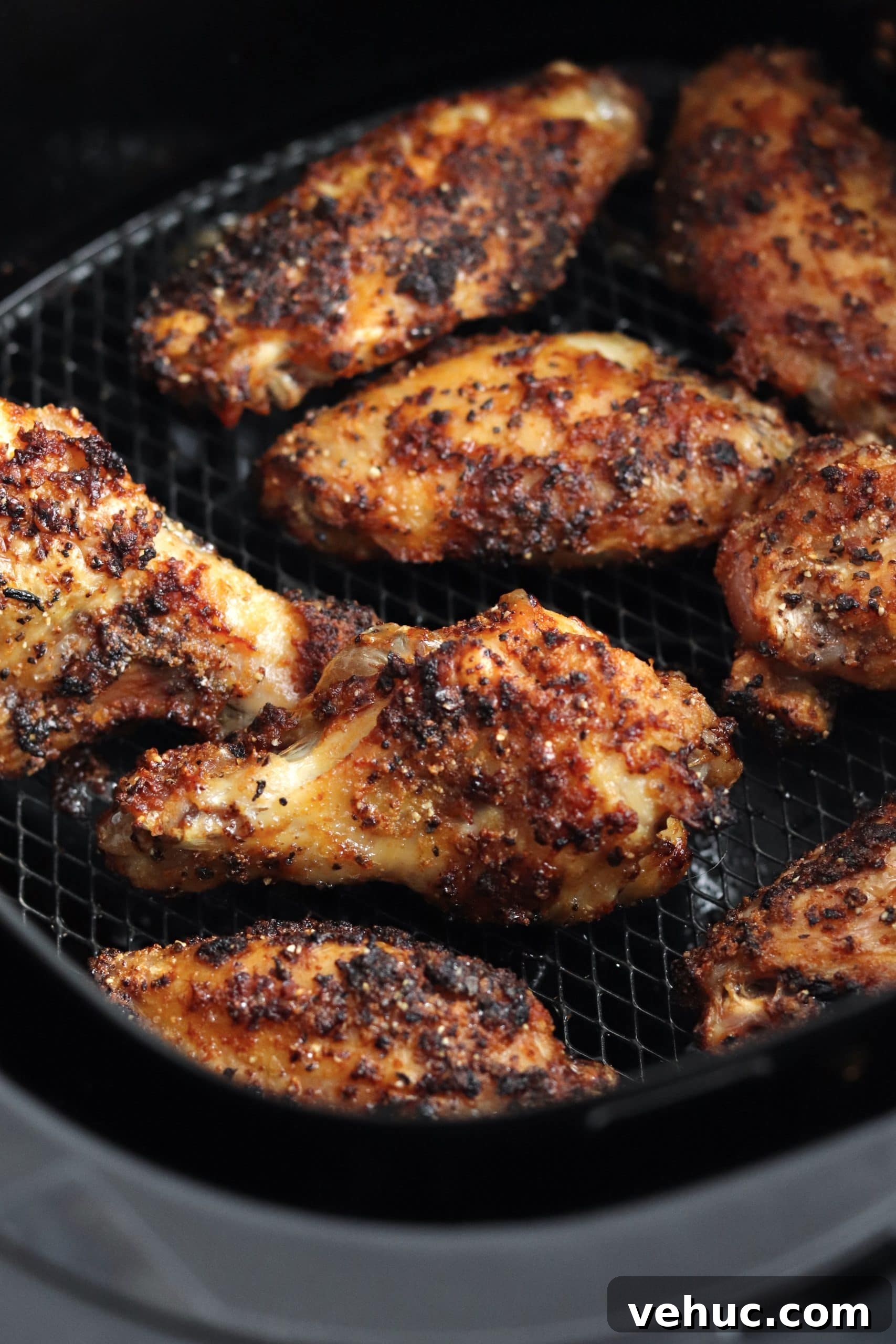 Crispy Air Fryer Chicken Wings Recipe for Perfectly Golden Wings 6 Close up of dry rub crispy chicken wings in an air fryer
