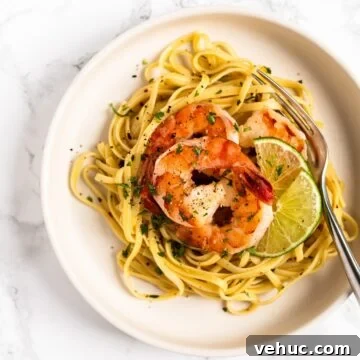 a top down view of a plate of cilantro lime shrimp pasta