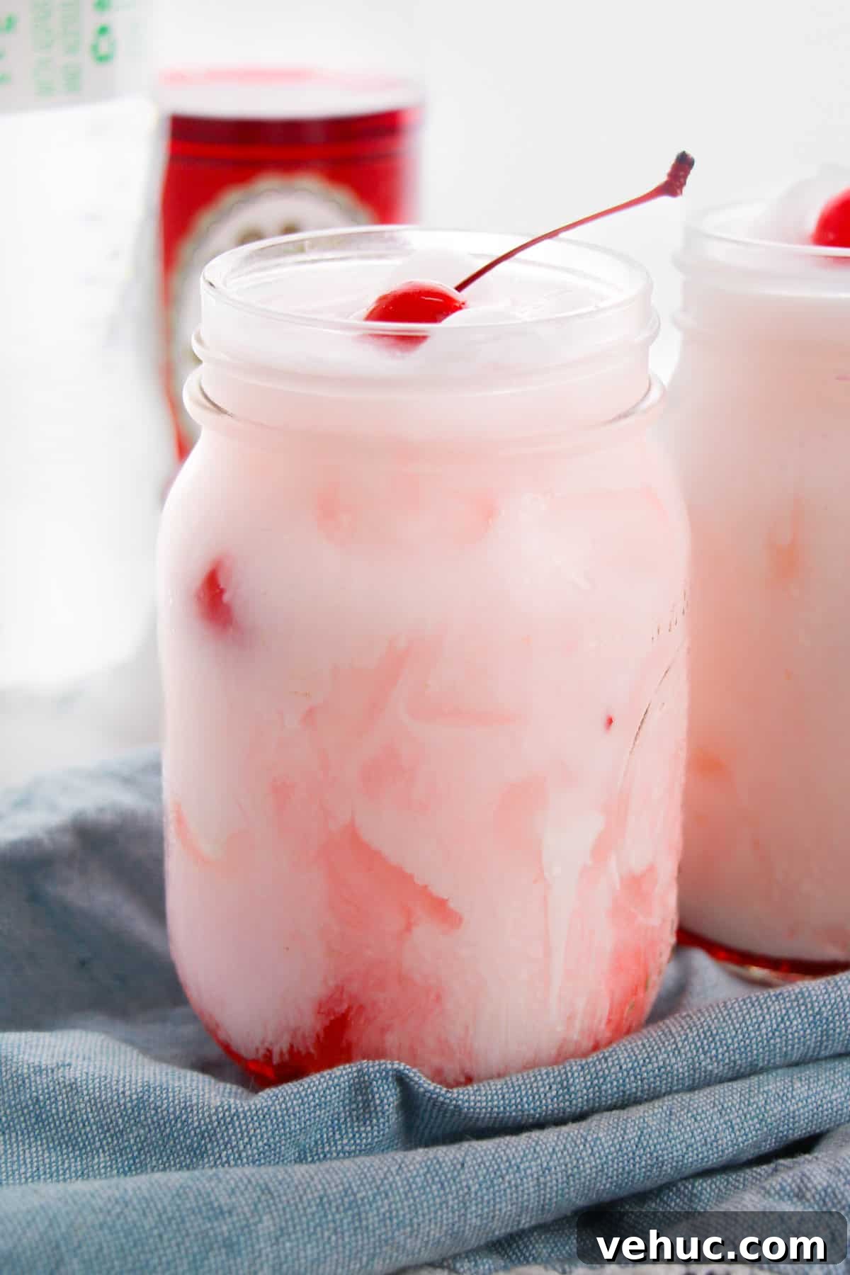 Shirley Temple Dirty Soda Recipe — Sparkling Cherry Lime Mocktail 2 Shirley temple dirty soda with Sprite, grenadine, creamer, and maraschino cherry.