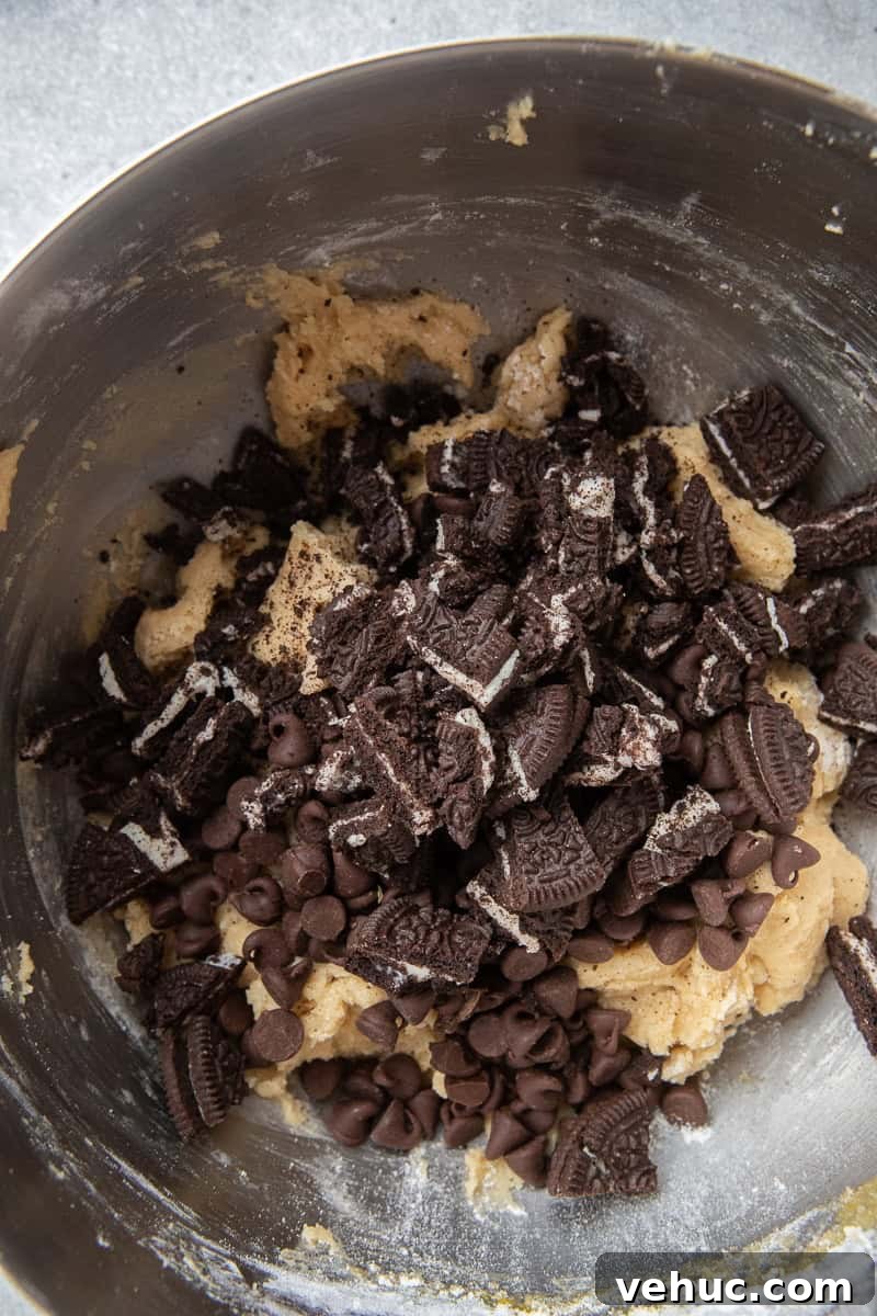 Oreos in cookie dough in bowl