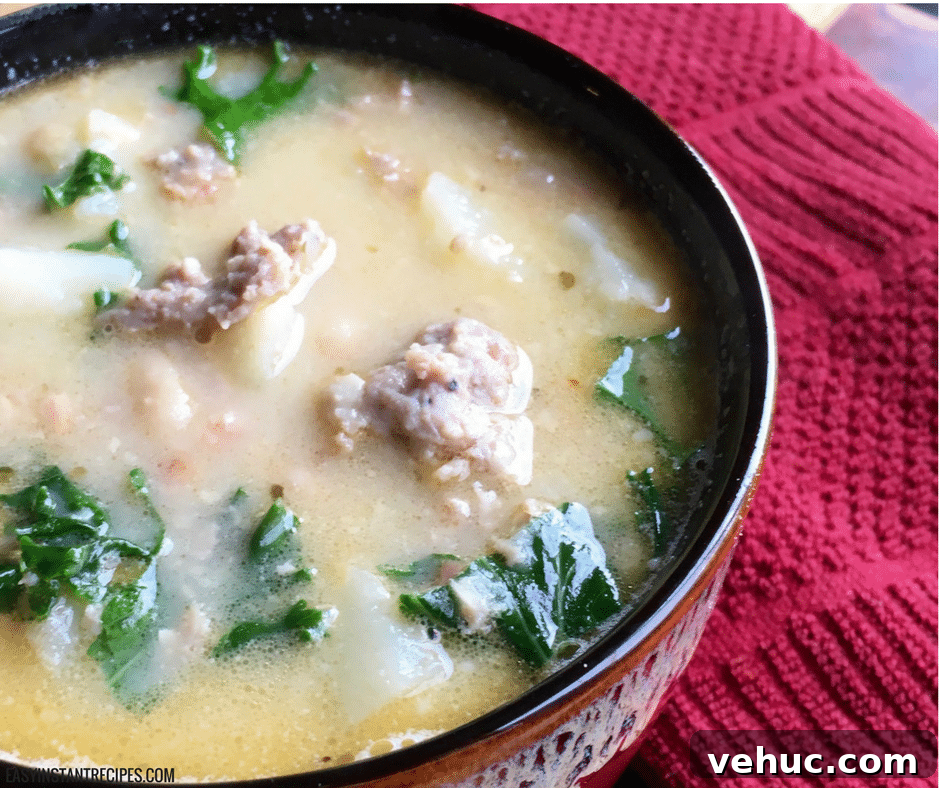 Instant Pot Zuppa Toscana: Creamy Sausage & Potato Soup Recipe 2 Bowl of Zuppa Toscana soup with kale and sausage