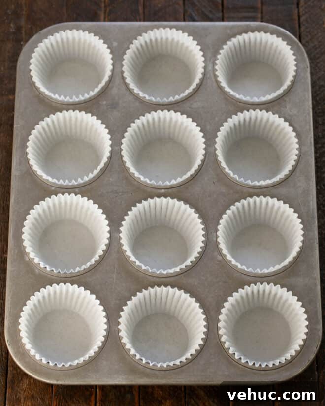 Moist Buttermilk Corn Muffins Recipe for Perfect Breakfast 3 Muffin tin with paper liners.