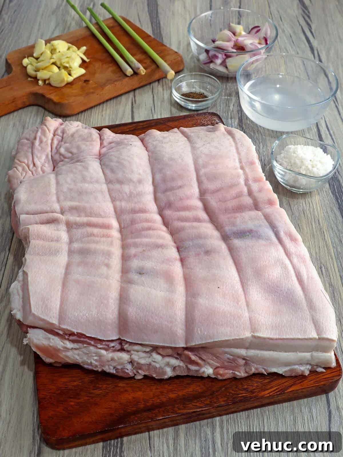 Crispy Pork Belly Lechon Roll Recipe: Filipino-Style Roast Pork 4 pork belly slab, vinegar, garlic, lemongrass, salt, pepper, onions