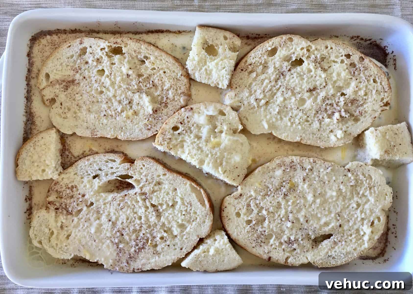 Baked Cannoli French Toast Recipe for a Sweet Brunch 9 custard poured over the top half of the breakfast casserole.