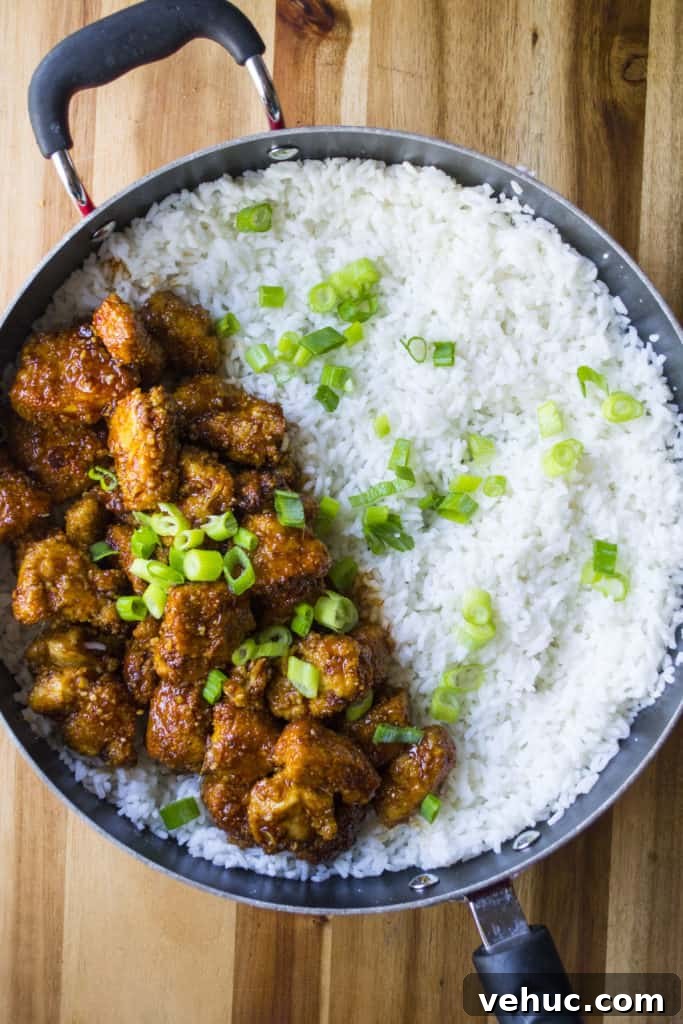 Sticky Sweet-Spicy Chicken and Quick 30-Minute Rice Bowl 3 Sticky Chicken Rice Bowl is the perfect combination of tender rice and baked chicken bites covered in a thick sticky sauce.