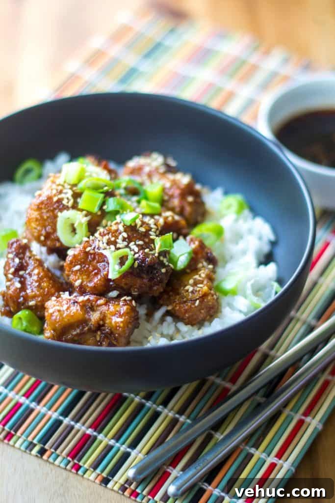 Sticky Sweet-Spicy Chicken and Quick 30-Minute Rice Bowl 9 Sticky Chicken Rice Bowl is the perfect combination of tender rice and baked chicken bites covered in a thick sticky sauce.