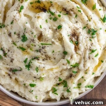 Mashed potatoes made with brown butter in bowl.