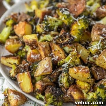 close-up of roasted potatoes and broccoli on plate