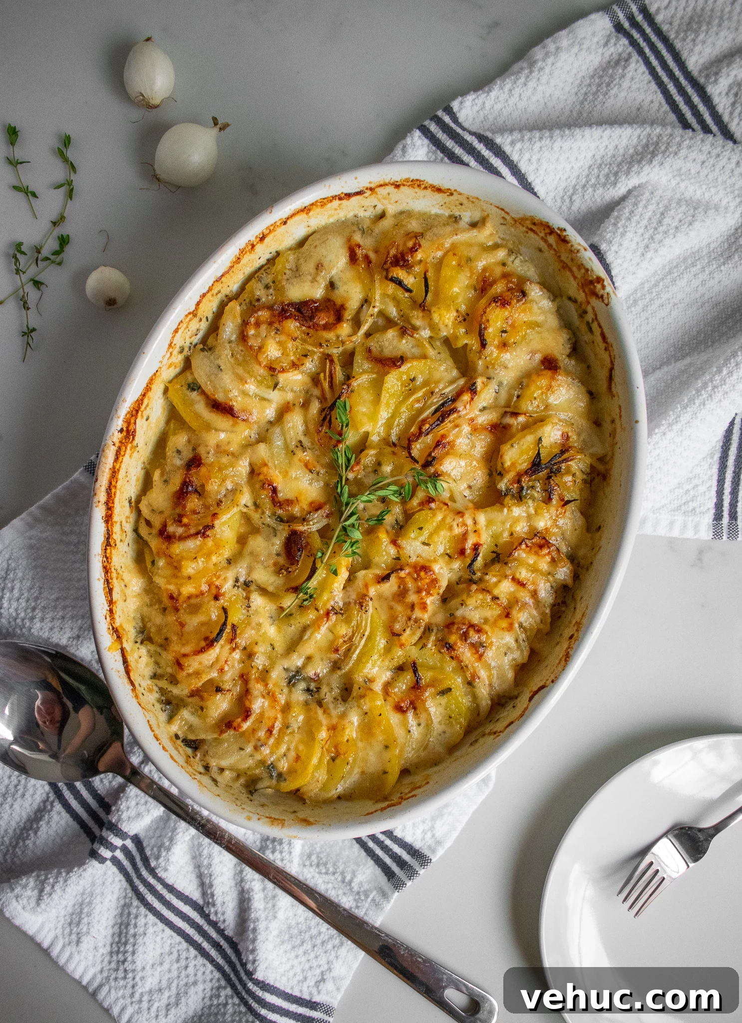 Danish creamy scalloped potatoes with onion and thyme.